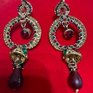 Gold earrings with green and red stone